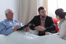 Man In Hospital Bed